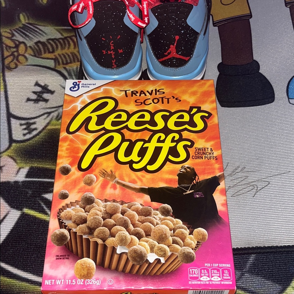 Travis Scott Reese's Puffs Cereal Box with Red and Black Sneakers